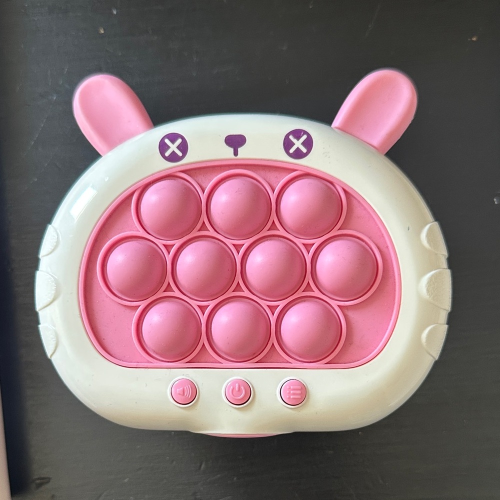 Pink and White Pop Toy